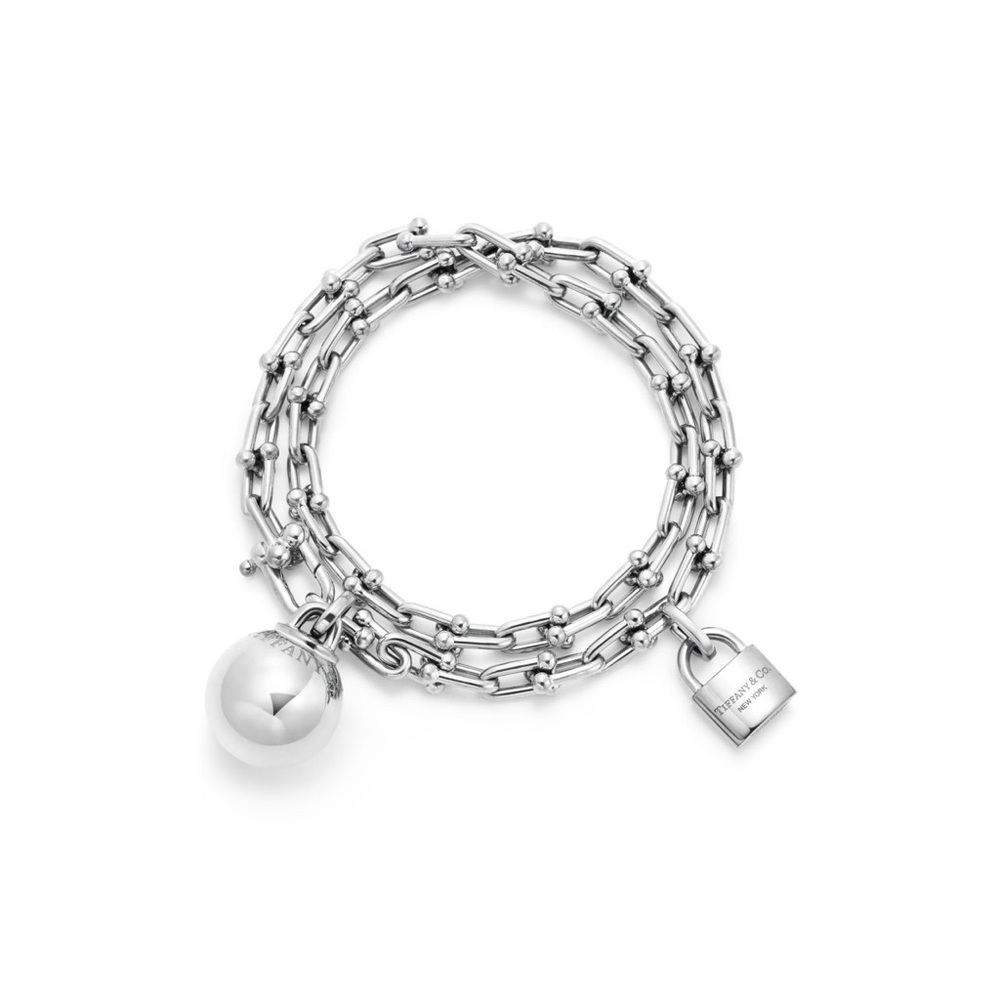 Tiffany and Co HardWear wrap bracelet with ball and lock charm.